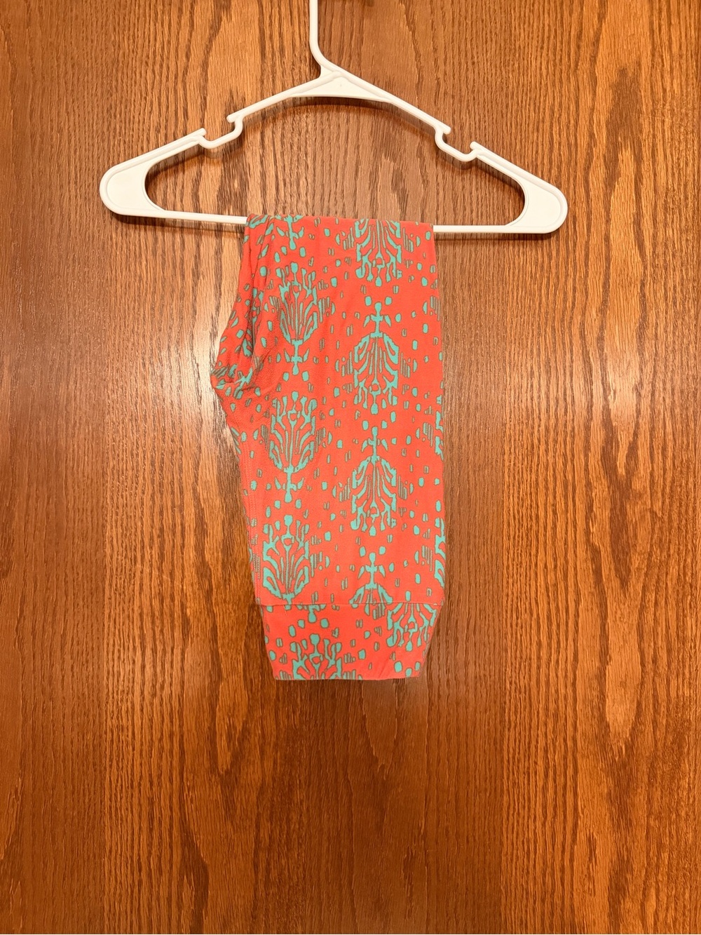 LuLaRoe Coral Leggings with Teal Floral Motif